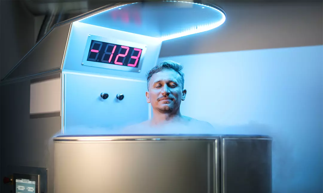 man in cryotheapy chamber